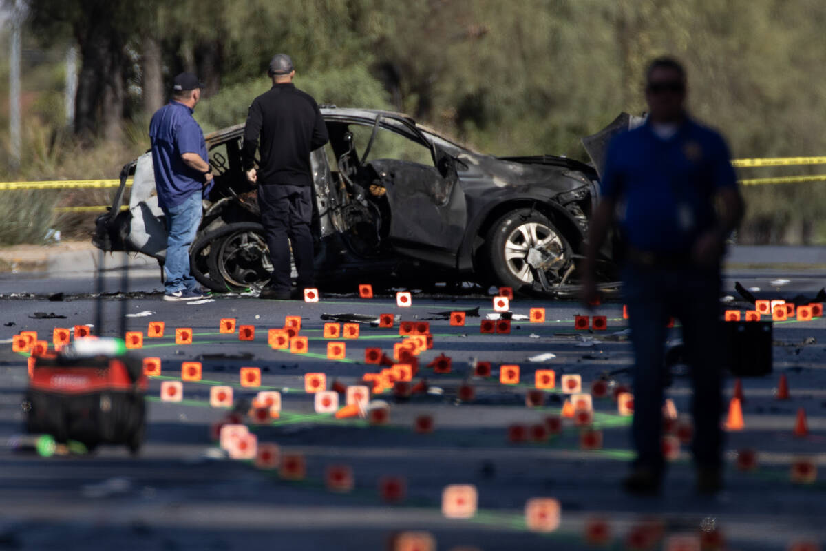 Las Vegas Metropolitan Police Department investigates a fatal crash near South Rainbow Boulevar ...