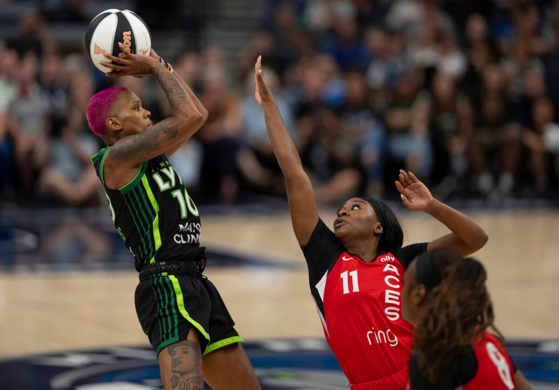 Minnesota Lynx guard Courtney Williams (10) shoots a three-pointer over the defense of Las Vega ...