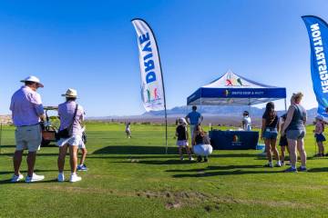 A competitor drives during qualifying for the Drive, Chip and Putt competition that finishes in ...