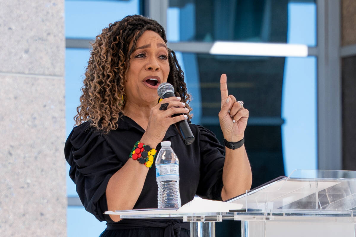 Rachel Oliver-Cobbin, director of student ministries at Mountaintop Faith Ministries, sings dur ...