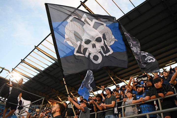San Jose Earthquakes fans cheer for their team during the first half of an MLS soccer match aga ...