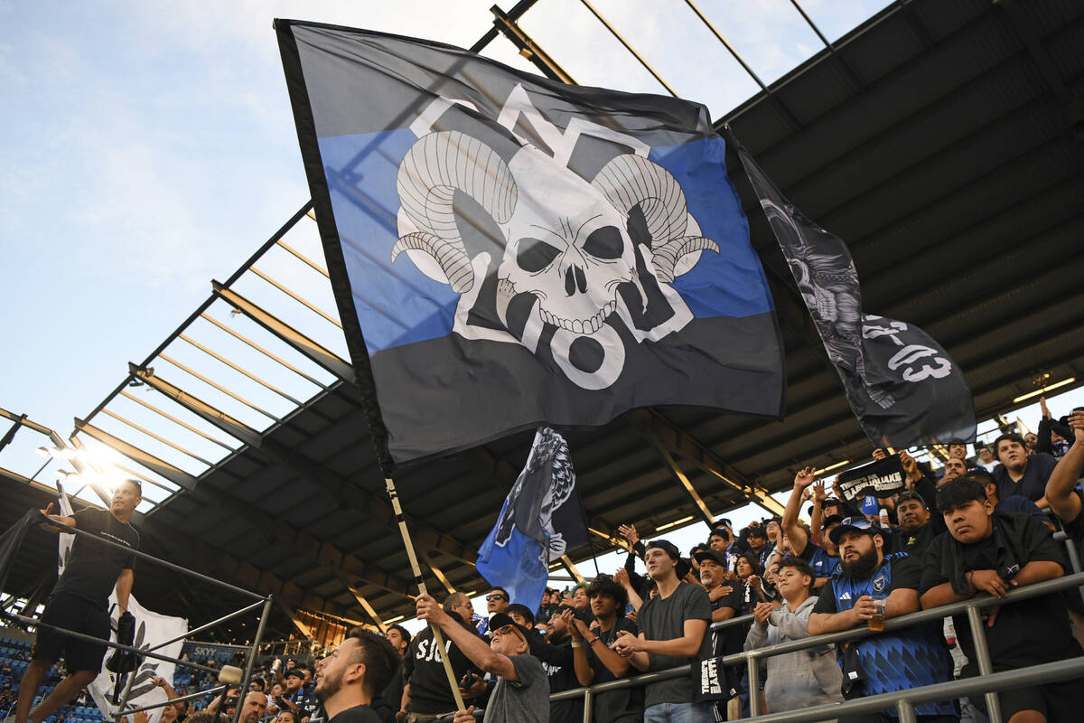San Jose Earthquakes fans cheer for their team during the first half of an MLS soccer match aga ...