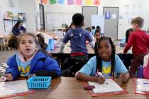 Samantha Leyva De La Vega, left, and Za’Kariya-Henderson work in the classroom of Kinder ...