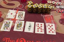 A pai gow player hit a progressive jackpot with a seven-card straight flush for $137,023 and sc ...