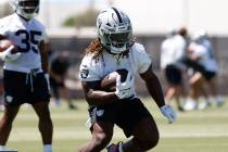 Raiders running back Ashton Jeanty goes through a drill during the 2025 rookie mini camp at the ...