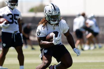 Raiders running back Ashton Jeanty goes through a drill during the 2025 rookie mini camp at the ...