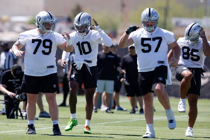 Raiders defensive line Laki Tasi (79) wide receiver Donte Thornton Jr. (10) and linebacker Jail ...