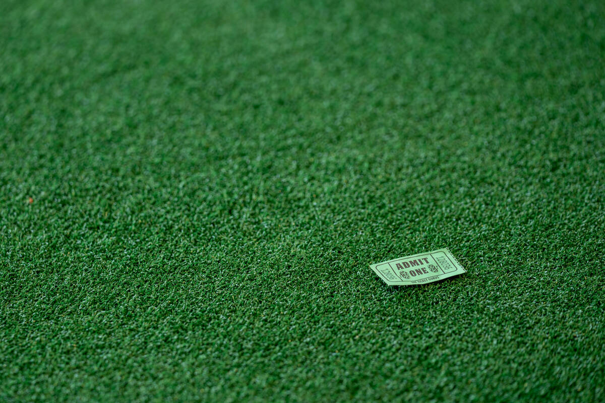 A parking ticket lies on the ground during the groundbreaking ceremony for the Athletics&#x2019 ...