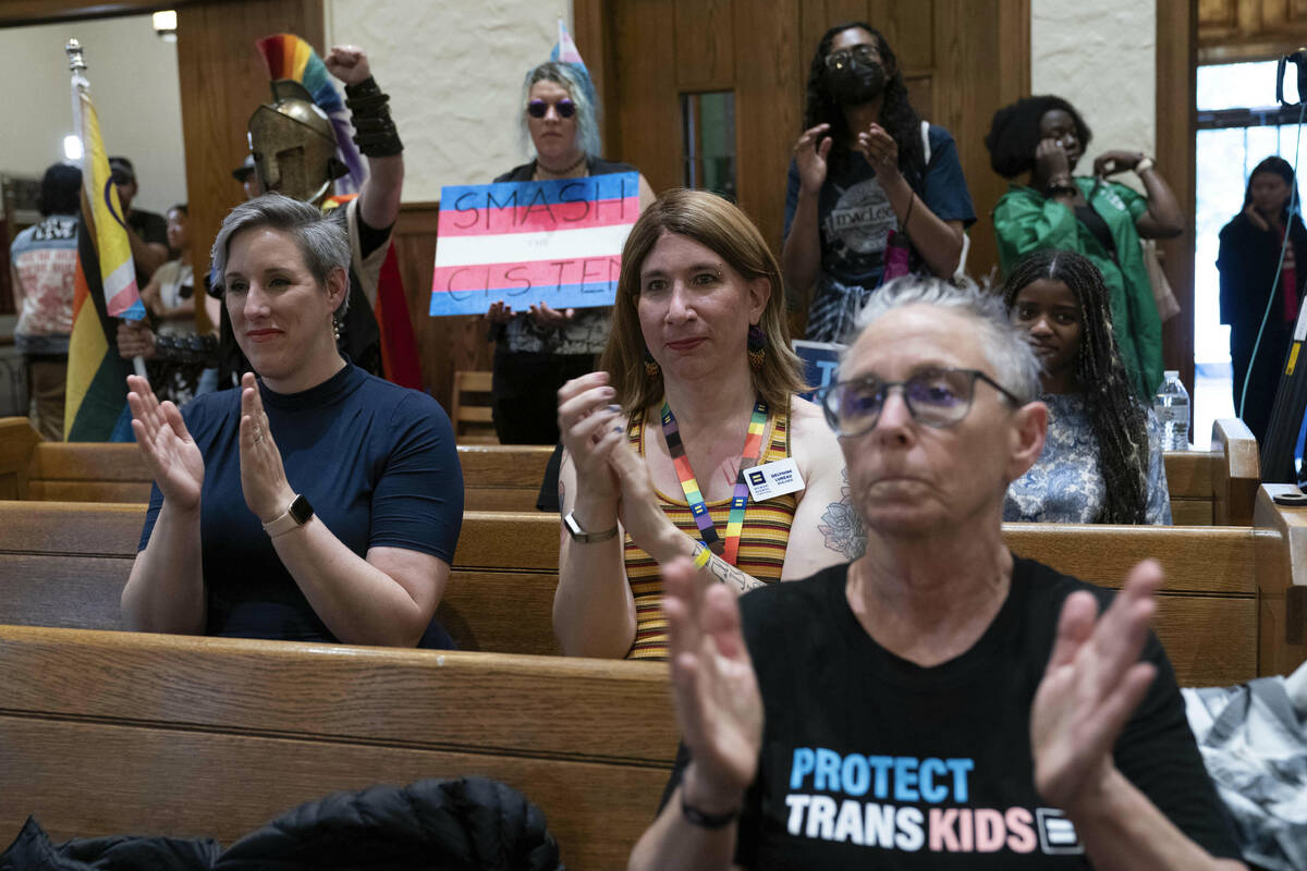 Transgender rights supporters rally at the Lutheran Church of the Reformation on Capitol Hill, ...