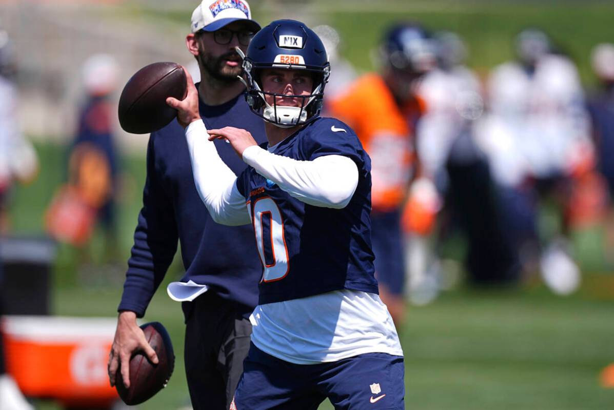Denver Broncos quarterback Bo Nix (10) takes part in drills during an NFL football team practic ...
