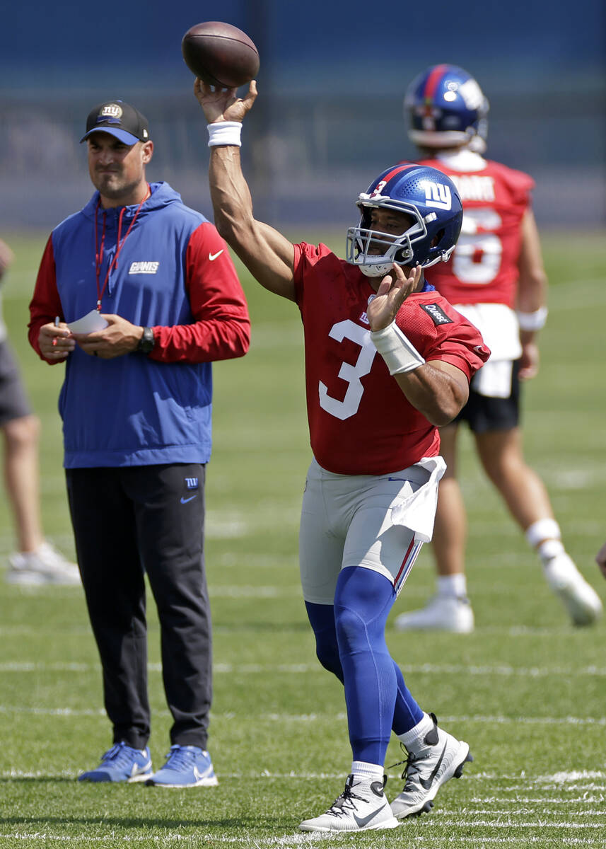 New York Giants quarterback Russell Wilson (3) passes the ball during an NFL football practice ...