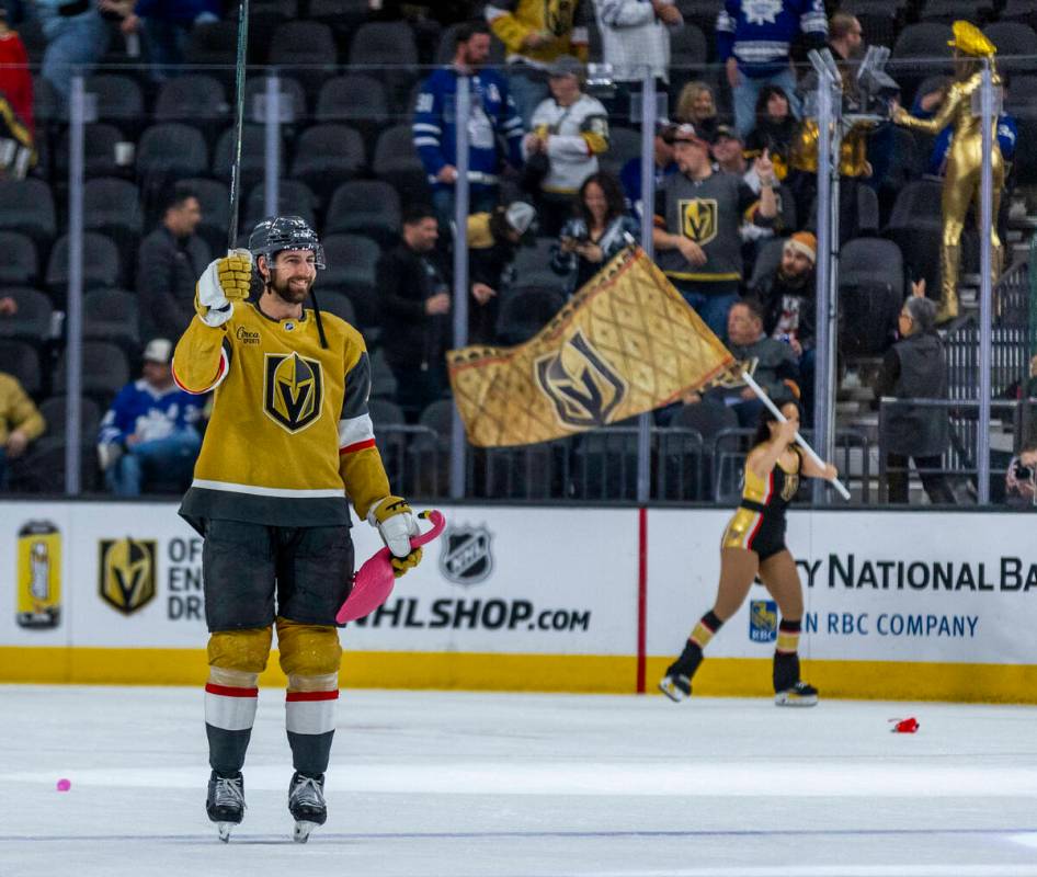 Golden Knights defenseman Nicolas Hague (14) celebrates the win with a flamingo against the Tor ...