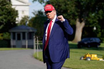 President Donald Trump walks on the South Lawn upon arriving at the White House, Saturday, June ...