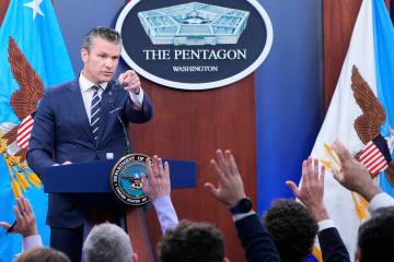 Defense Secretary Pete Hegseth calls on reporters for questions during a news conference at the ...