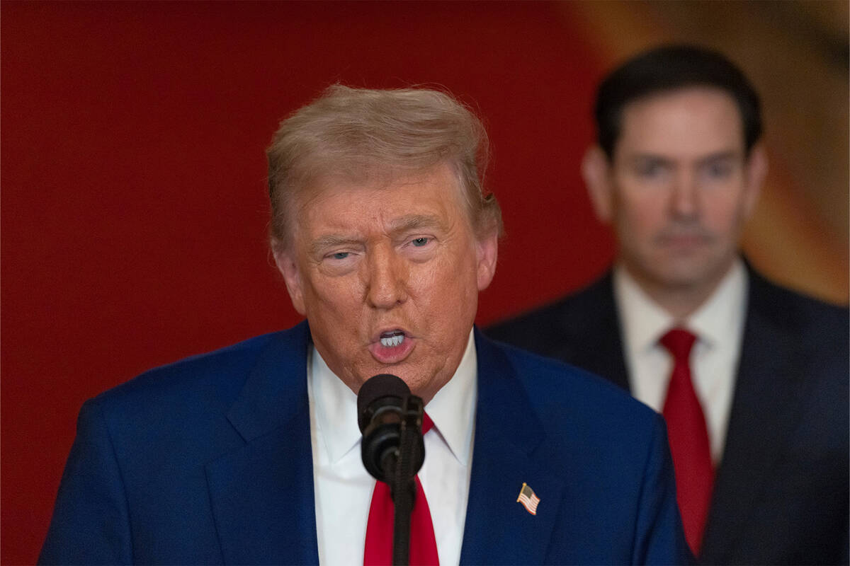 President Donald Trump speaks from the East Room of the White House in Washington, Saturday, Ju ...
