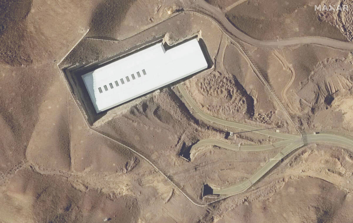 This satellite image provided by Maxar Technologies shows the Fordo enrichment facility in Iran ...