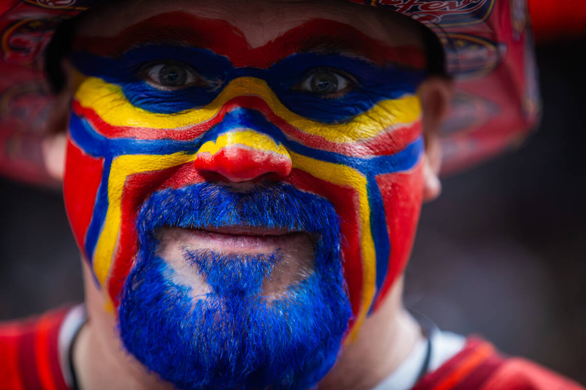 An Indiana Fever fan shows off their face paint during a WNBA basketball game between the Aces ...