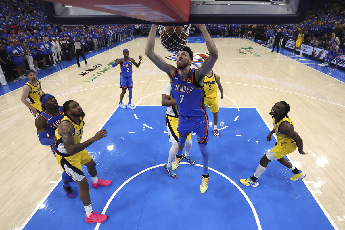 Oklahoma City Thunder forward Chet Holmgren (7) dunks against the Indiana Pacers during Game 7 ...