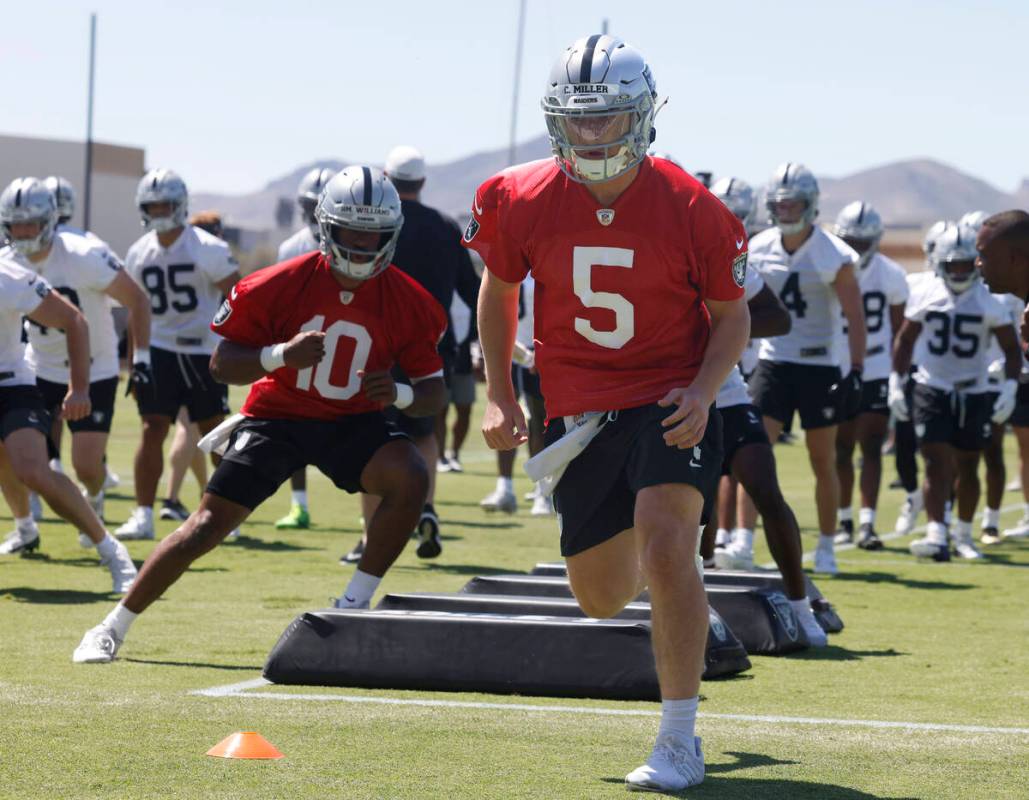 Raider quarterback Cam Miller goes through a drill during the 2025 rookie mini camp at the Inte ...