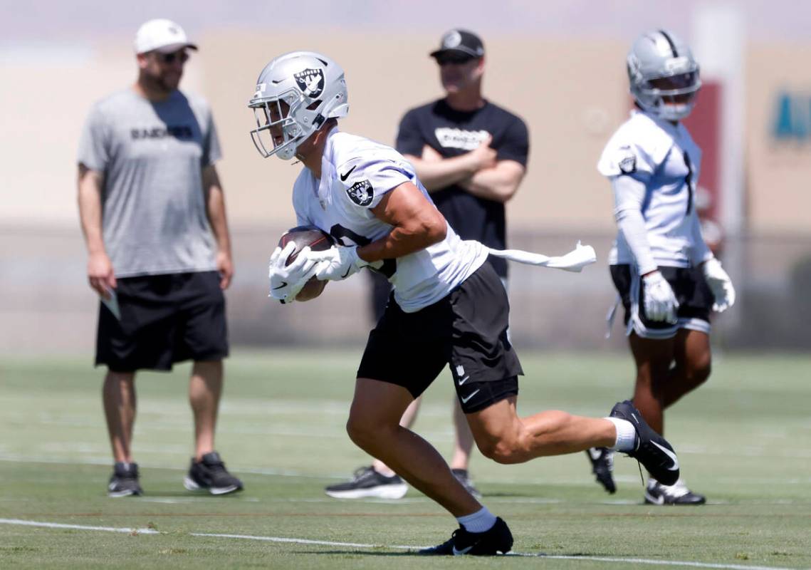 Raiders wide receiver Jack Bech (18) runs with the ball during an NFL mandatory football minica ...