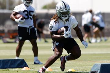 Raiders running back Ashton Jeanty goes through a drill during the 2025 rookie mini camp at the ...