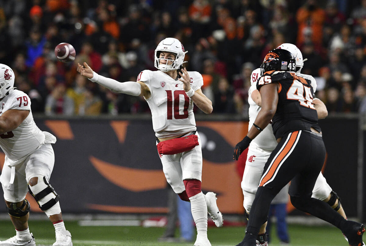 Washington State quarterback John Mateer (10) throws a pass against Oregon State during the fir ...