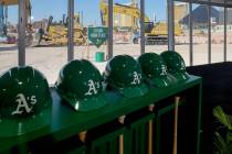 A sign marks the spot for the future home plate during a groundbreaking ceremony for the Athlet ...