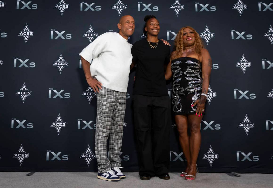 Aces guard Jewell Loyd, center, poses with parents Calvin Loyd, left, and Gwendolyn Davis-Loyd ...