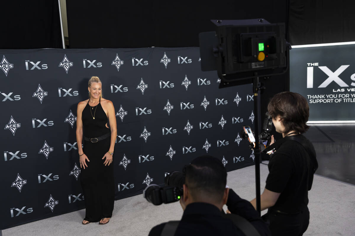 Five-time Olympian Kerri Walsh Jennings poses on the red carpet for The IX Awards held by the A ...