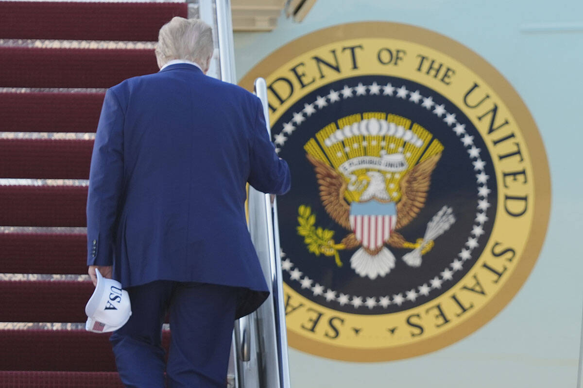 President Donald Trump boards Air Force One, Tuesday, June 24, 2025, at Joint Base Andrews, Md. ...