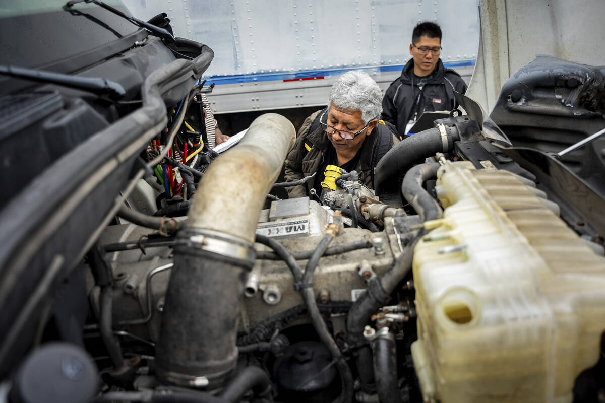 A student studies a truck engine at the Driving Academy on Tuesday, June 10, 2025 in Linden, N. ...