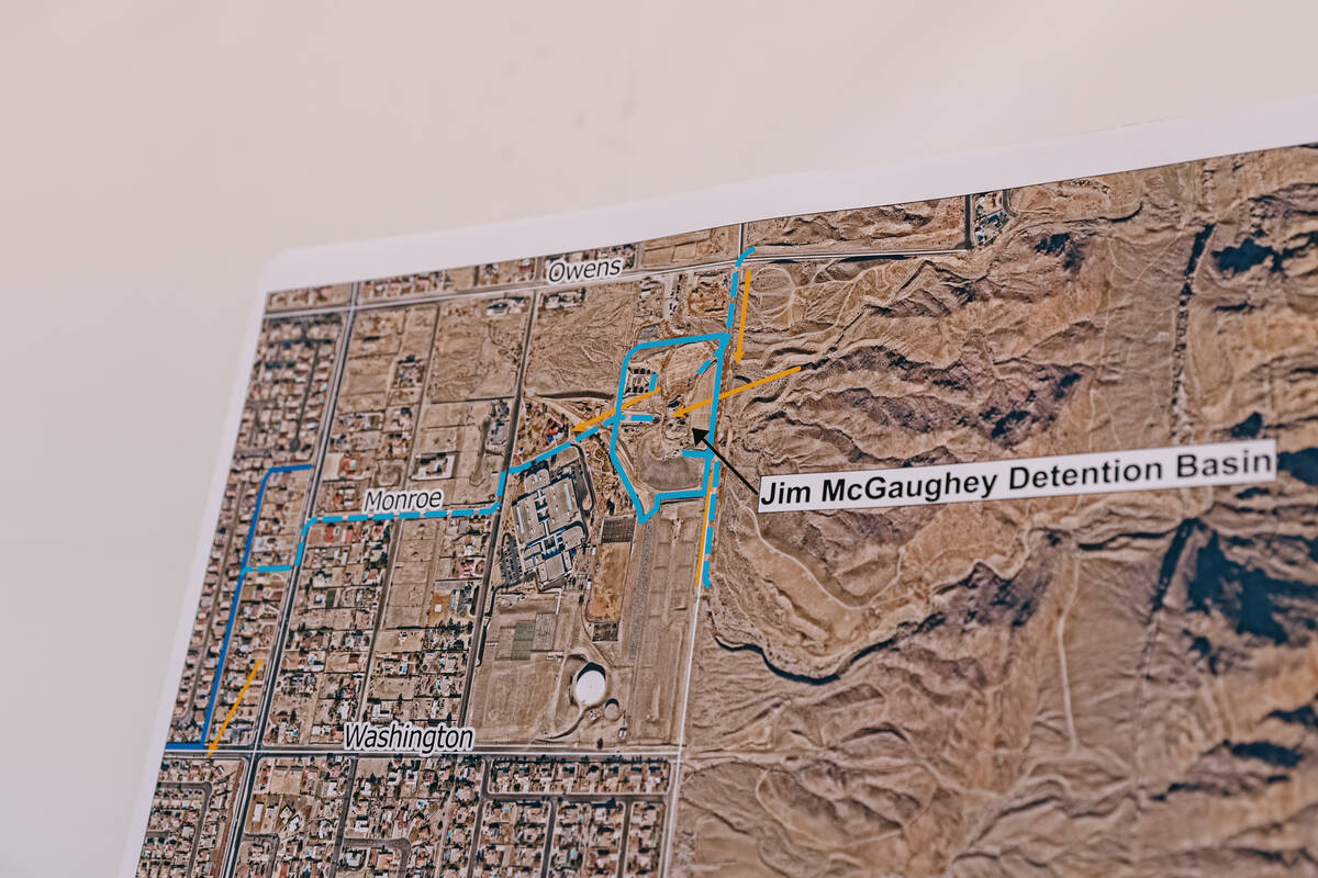 A map marks out the future location of the Jim McGaughey Detention Basin on Tuesday, June 24, 2 ...