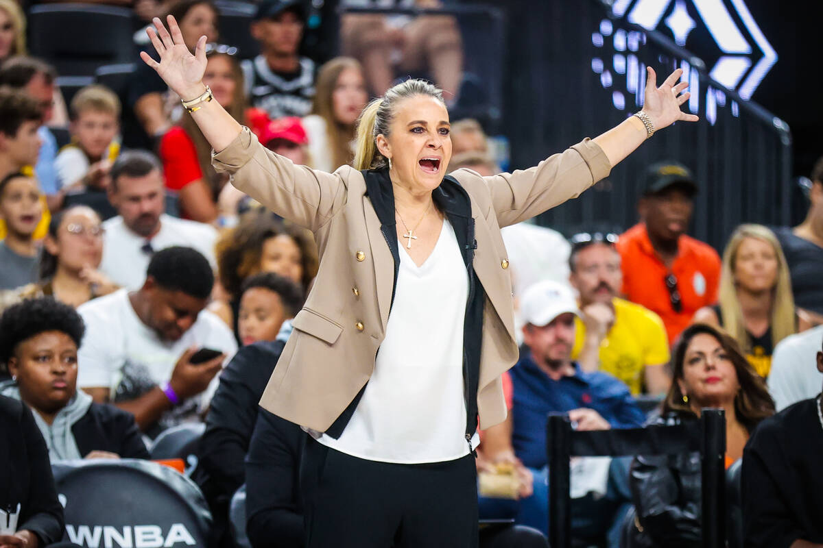 Aces head coach Becky Hammon coaches from the sidelines during a WNBA basketball game between t ...