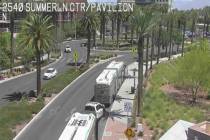A Metropolitan Police Department vehicle is between two RTC buses Tuesday, June 17, 2025, outsi ...