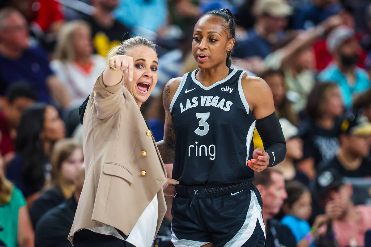 Aces head coach Becky Hammon coaches Aces guard Tiffany Mitchell (3) during a WNBA basketball g ...