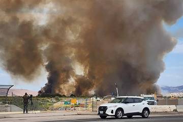 A fire at Clark County Wetlands Park is seen Tuesday, June 24, 2025, in Las Vegas. (Chase Steve ...