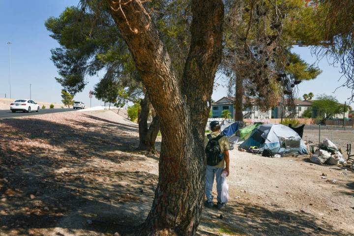Homeless encampments are seen next to the Boulder Highway onramp to Interstate 11 Thursday, Jun ...