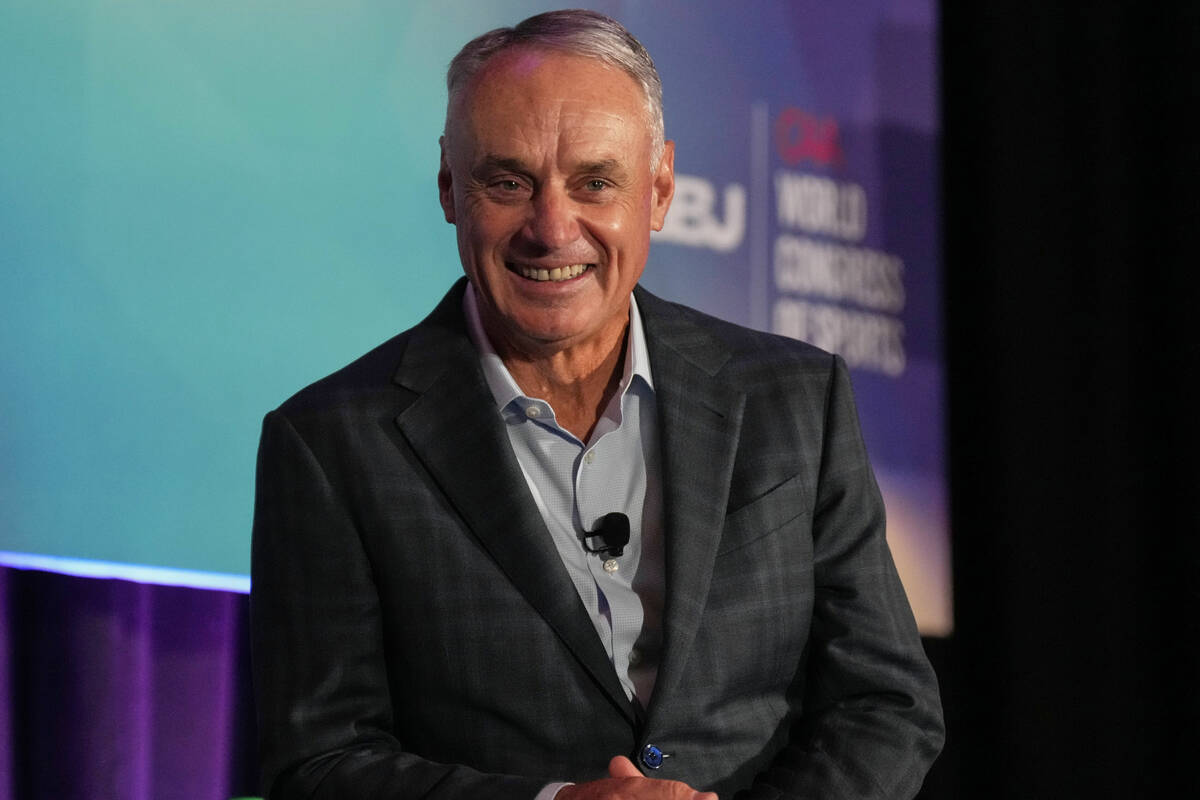 FILE - MLB Commissioner Rob Manfred speaks at the SBJ CAA World Congress of Sport, April 22, 20 ...