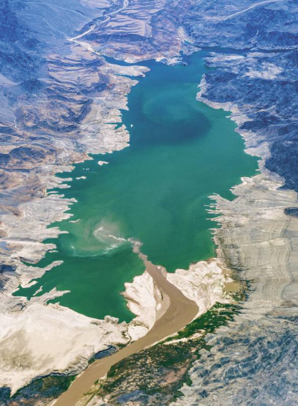 The silt-laden Colorado River flows into the upper reaches of Lake Mead on Wednesday, June 18, ...