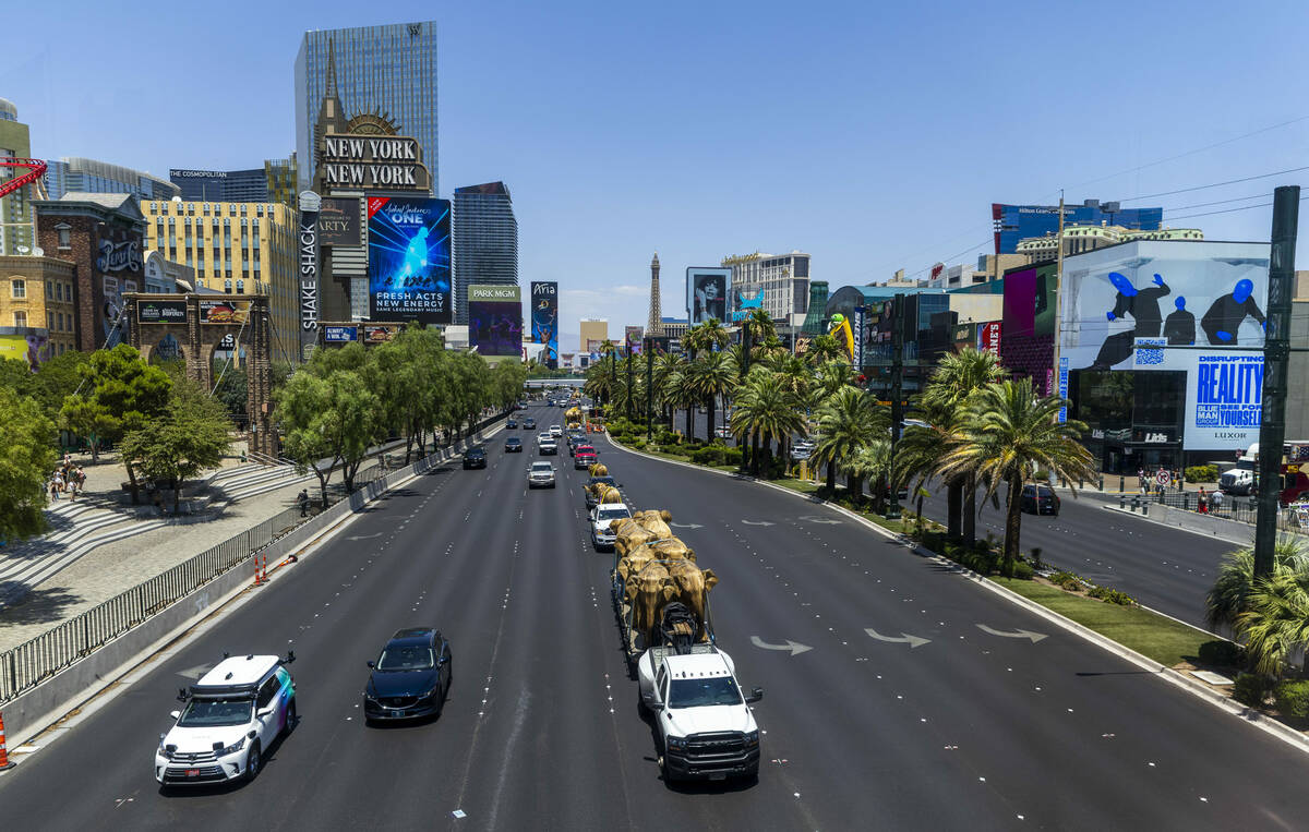 The Great Elephant Migration proceeds down the Strip after beginning at the Historic Commercial ...