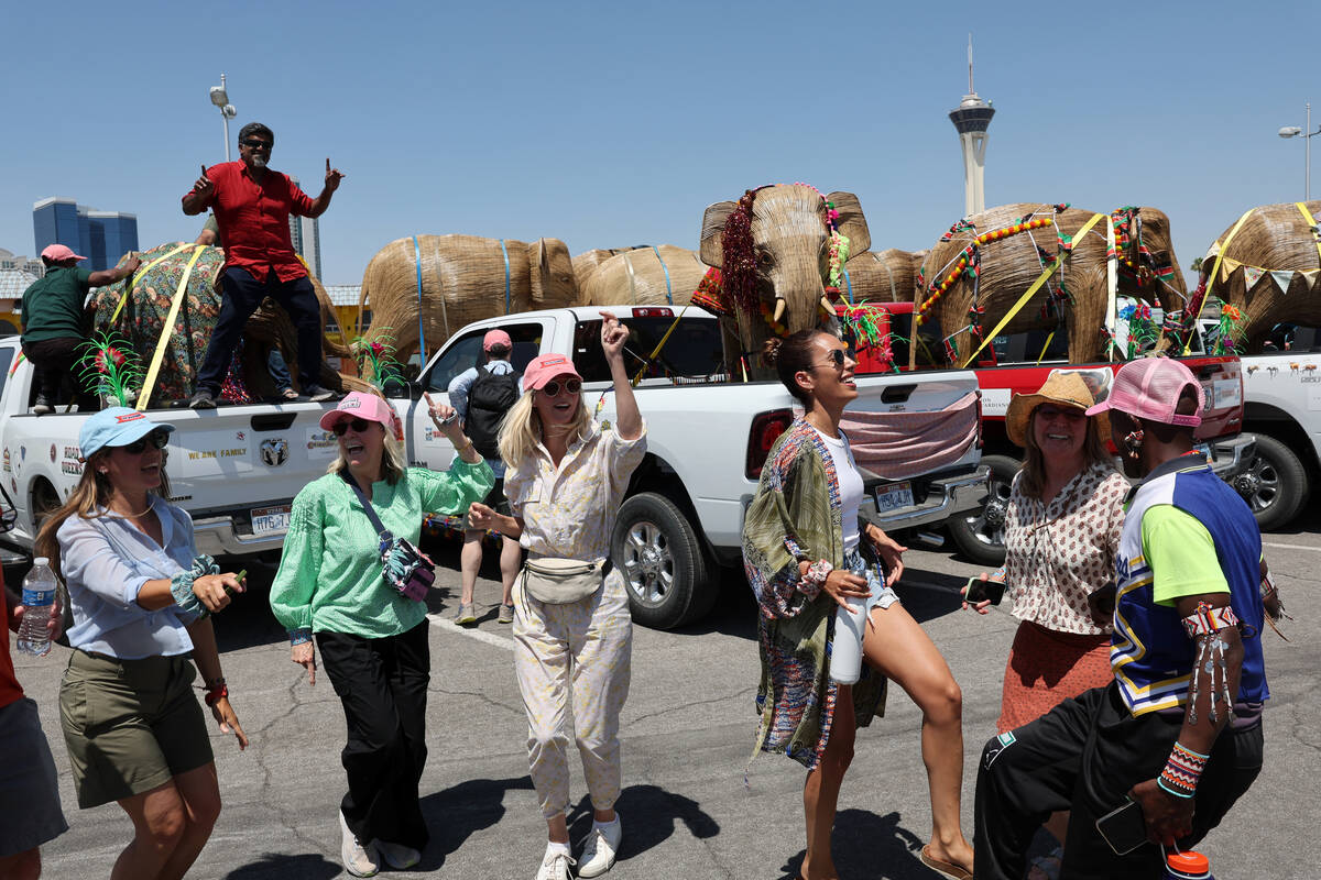 Volunteers celebrate in the Commercial Center in Las Vegas as part of The Great Elephant Migrat ...