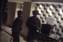 This screenshot from video shows Metropolitan Police Department officers responding to the Mand ...
