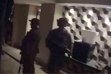 This screenshot from video shows Metropolitan Police Department officers responding to the Mand ...