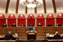Justices prepare for oral arguments in the Nevada Supreme Court in Las Vegas on April 9, 2024. ...