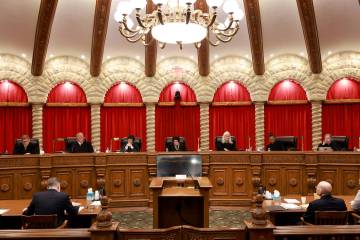 Justices prepare for oral arguments in the Nevada Supreme Court in Las Vegas on April 9, 2024. ...