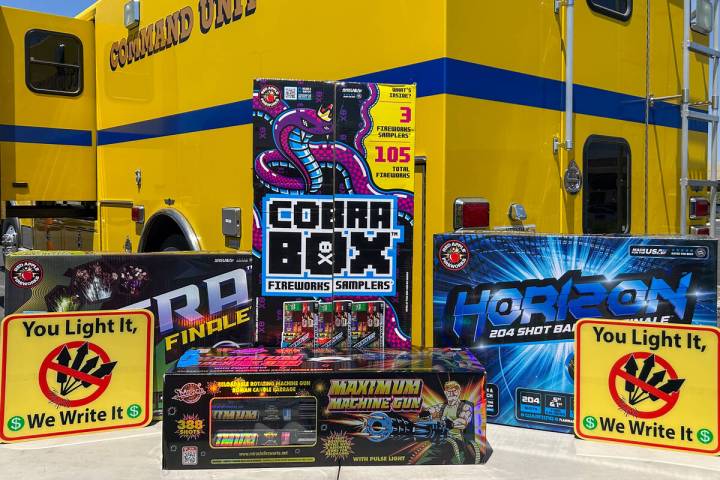 A set of fireworks sits on a fold-out table in front of a Clark County Fire Department Command ...
