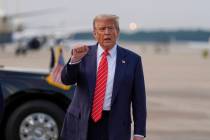 President Donald Trump gestures after arriving on Air Force One, Wednesday, June 25, 2025, at J ...