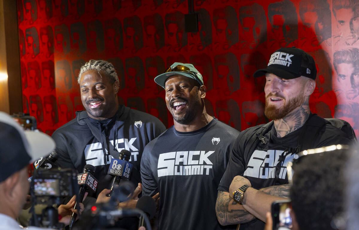 NFL defensive players Cam Jordan, Von Miller and Maxx Crosby enjoy a talk with members of the m ...