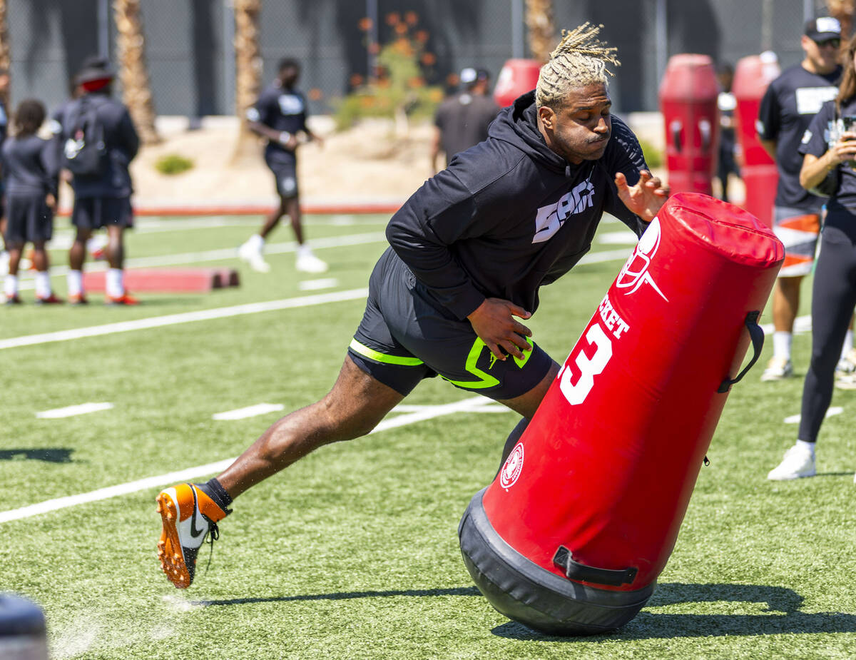 Saints defensive end Cam Jordan runs through a drill during Sack Summit 2025 at the UNLV Fertit ...