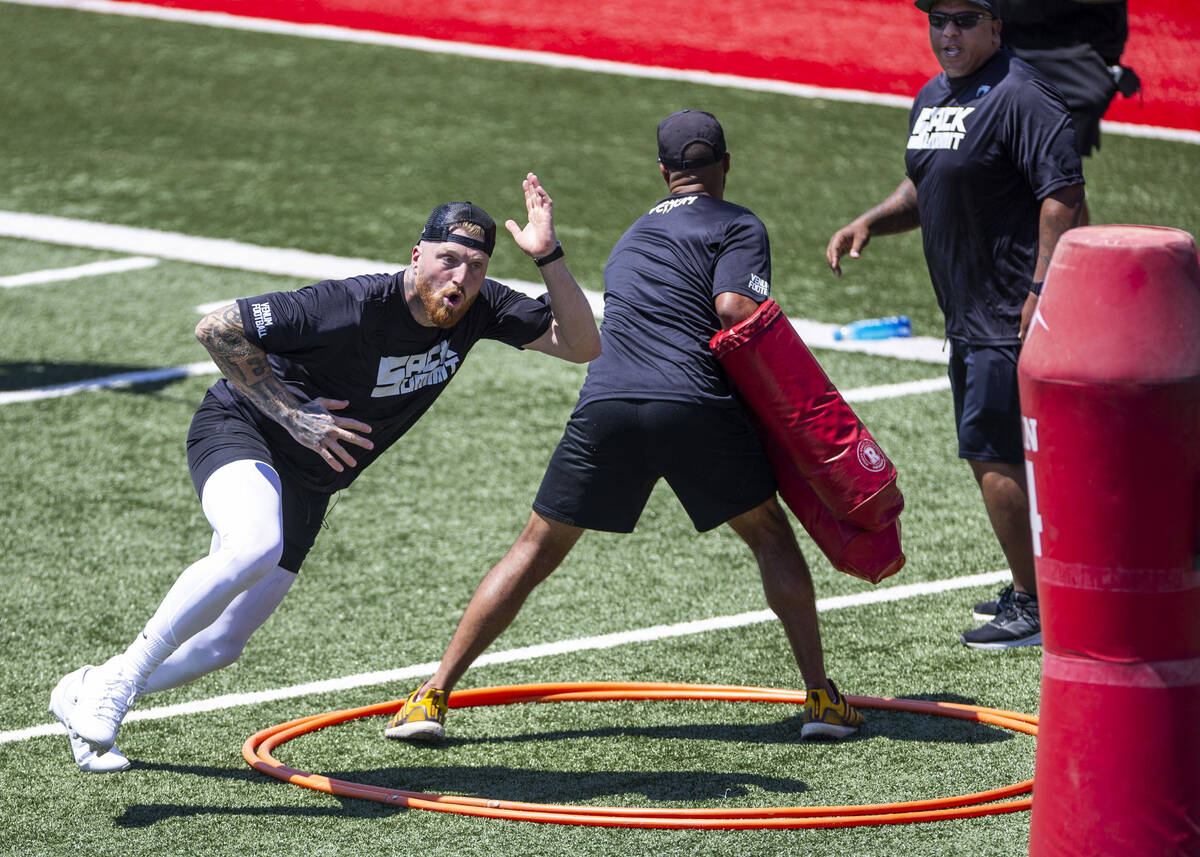 Raiders defensive end Maxx Crosby runs through a drill during Sack Summit 2025 at the UNLV Fert ...